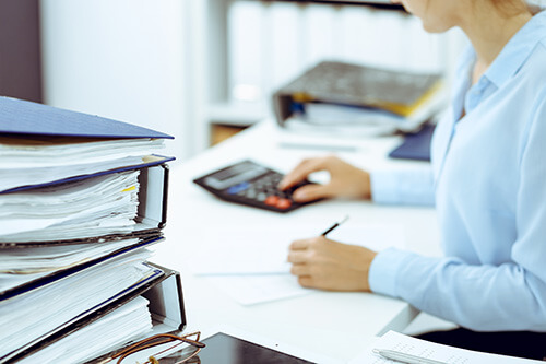 Small Business Accountant working on tax preparation Small Business Accountant working on tax preparation